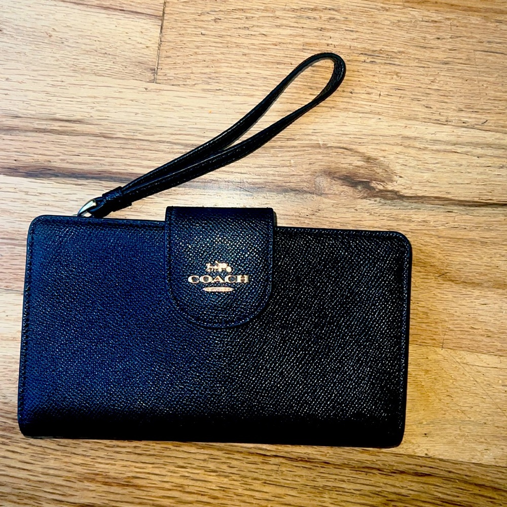 Coach tech wallet fits 6.33H x 3.07W x 0.31 D
